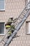 The rescuer rises up the fire escape to a multi-storey building