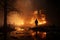 Rescuer sprays water amidst charred ruins, extinguishing remnants of devastating house fire