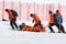 Rescuers evacuated injured skier sportsman from mountain on rescue stretchers