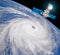 Research, probing, monitoring typhoon. Satellite above the Earth makes measurements of the weather parameters. Elements of this im