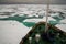 Research vessel in icy arctic sea