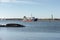 Research vessel Neptune passing rocks along Fairhaven shoreline