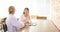 Researchers and scientists talking and drinking coffee at a cafe in their leisure time