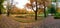 The reservoir and Park paths covered with fallen leaves in the Mikhailovsky Park .Autumn landscape, St. Petersburg