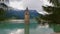 Reservoir Reschensee, South Tyrol, Italy with lone standing steeple in the water in early summer.
