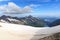 Reservoir Wasserfallboden and mountain snow panorama with summit Kitzsteinhorn in Glockner Group, Austria