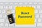 Reset password with lock on a keyboard with a sticky note