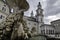 Residence Fountain Residenzbrunnen in the foreground and in the background the Cathedral of Salzburg, Austria