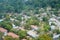 Residential area aerial - houses, trees and gardens