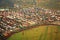 Residential area with houses and streets from above. cityscape with small old beautiful village top view.