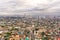 Residential areas and streets of Manila, Philippines, top view. Roofs of houses and roads