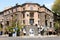 Residential building in center of Yerevan, built of traditional pink tuff - volcanic rock