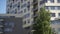 Residential building in New microdistrict. Close up Of An Apartment Blocks. The building features exterior with small
