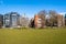 Residential Buildings Facing a Beautiful Park and Blue Sky