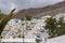 Residential buildings at the foot of the cliff in Los Gigantes