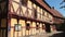 Residential buildings of the old city in Europe. Traditional architecture half-timbered houses. Old Danish small tourist