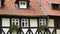 Residential buildings of the old city in Europe. Traditional architecture half-timbered houses. Old German small tourist