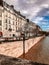 Residential buildings overlook the Seine River on the Ile Saint-Louis in Paris, France