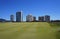 Residential buildings viewed from the Rio Olympic Golf Course in Barra da Tijuca