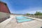 Residential community adult and kid swimming pool with mountain and sky view