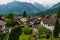 residential district of small town Fussen near Neuschwanstein castle. Small alpine chalets with red