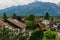 Residential district of small town Fussen near Neuschwanstein castle. Small alpine chalets with red