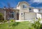 Residential home exterior front with landscaping