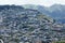 Residential homes built up the crowded slope of a Honolulu, Hawaii mountain side