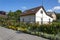 Residential house with a beautiful flower garden in the resort town of Zelenogradsk