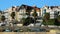 Residential houses lined up along waterfront walkway in resort city in morning