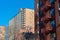 Residential Skyscrapers and a Fire Escape with a Clear Blue Sky in Flushing Queens of New York City