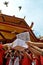 Residents of Chinese descent in Jakarta perform the ritual of releasing birds at a monastery in Glodok, Jakarta - Indonesia