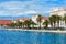 Residents and tourists walking along the shore in Split