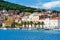 Residents and tourists walking along the shore in Split