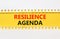 Resilience agenda symbol. Concept word Resilience agenda typed on yellow and white paper. Beautiful yellow and white background.