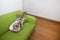 Resonator Guitar on a Green Sofa