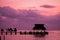 Resort dock tropical destination silhouette in the sunset light