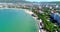 The Resort Of Gelendzhik. Flying over the beach from a bird`s eye view. A pebbly beach, rows of sun umbrellas and sun