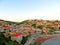 Resort town on the coast of Montenegro. Cove with boats on the Adriatic Sea, a small tourist town with beaches. Tourist trips,