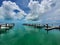 Resorts World Bimini Marina under summer cloudscape.