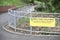 Respect our cycle path for cyclists joggers walkers kids yellow sign on fence