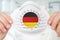 Respirator mask with flag of Germany - Coronavirus COVID-19 conc