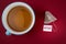 RESTART. Business concept. Tea bag and mug on a red background