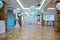 Restaurant decorated with white and turquoise balloons