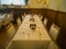 A restaurant interior with fancy old tables and chairs