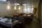 Restaurant interior with tables, sofas, light and honeycomb wall decorative texture background