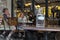 The restaurant Josephine in Chamonix France. People seated eating with a Josephine bottle in the foreground.