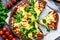 Restaurant kitchen with pizza preparing on stone background top