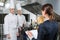 Restaurant manager briefing to his kitchen staff in the commercial kitchen.