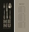 Restaurant menu with price list and old cutlery